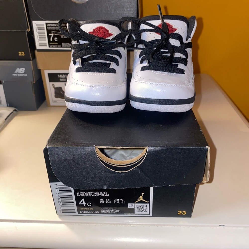 Jordan Kids White and Black Sneakers with Red Accents